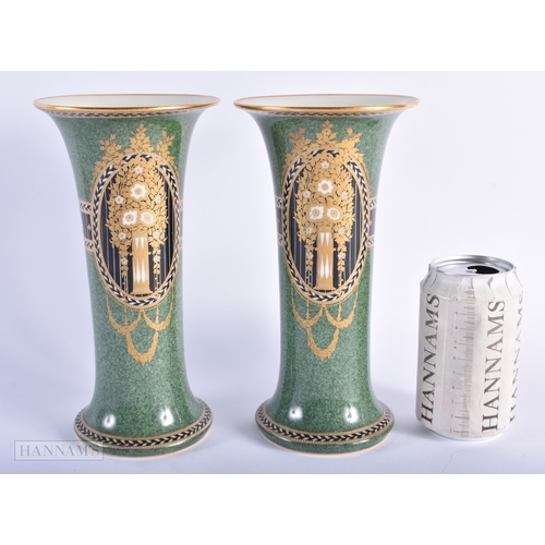 262 - A FINE PAIR OF ROYAL WORCESTER SECESSIONIST MOVEMENT VASES painted and gilded with flowers. 23.5 cm ... 