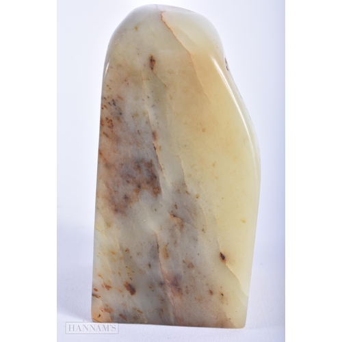 264 - A CHINESE QING DYNASTY CARVED JADE BOULDER SEAL. 11cm high.