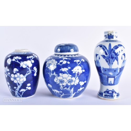 275 - TWO 19TH CENTURY CHINESE BLUE AND WHITE VASES together with a similar ginger jar and cover. Largest ... 