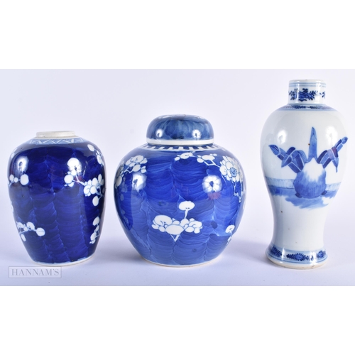 275 - TWO 19TH CENTURY CHINESE BLUE AND WHITE VASES together with a similar ginger jar and cover. Largest ... 