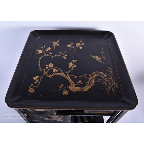 281 - A LATE 19TH CENTURY JAPANESE MEIJI PERIOD BLACK LACQUER CABINET decorated in gilt with birds and fol... 