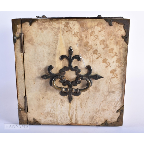 286 - AN ANTIQUE CONTINENTAL ANIMAL HIDE COPPER BOUND TABLE CABINET modelled in the 17th century manner. 2... 