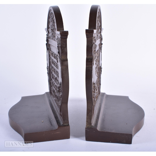 297 - A PAIR OF ARTS AND CRAFTS ENGLISH BRONZE BOOKENDS. Each end 18cm x 13 cm.