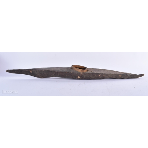 298 - AN ANTIQUE TRIBAL INUIT RAY SKIN CANOE together with two Inuit bone polar bear dishes. Largest 57 cm... 