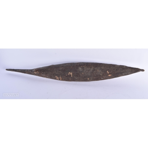 298 - AN ANTIQUE TRIBAL INUIT RAY SKIN CANOE together with two Inuit bone polar bear dishes. Largest 57 cm... 