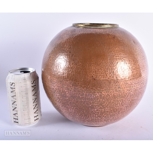 3 - AN ART DECO HAMMERED COPPER GLOBULAR VASE. 22cm x 19 cm.