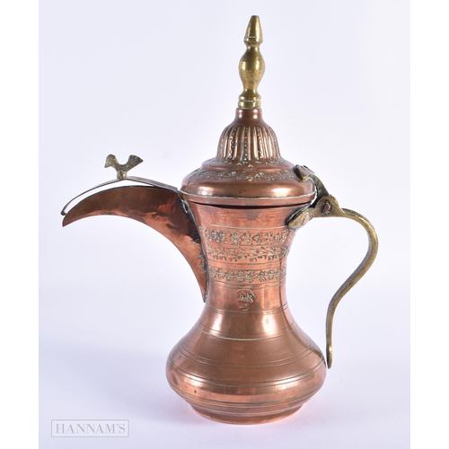 30 - AN OMANI MIDDLE EASTERN COPPER EWER. 26 cm high.