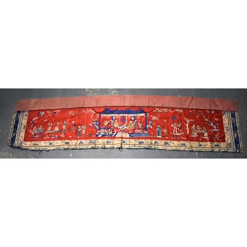 301 - A LARGE 19TH CENTURY CHINESE SILK EMBROIDERED RED PANEL Qing, decorated with figures in a landscape.... 