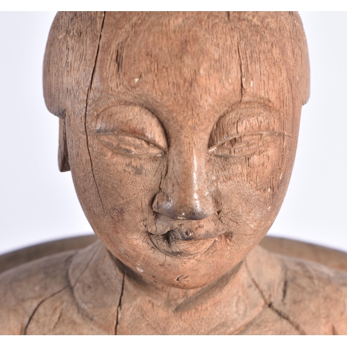 305 - A LARGE 17TH/18TH CENTURY CHINESE CARVED WOOD FIGURE OF A SCHOLAR Ming/Qing. 34 cm x 15cm.