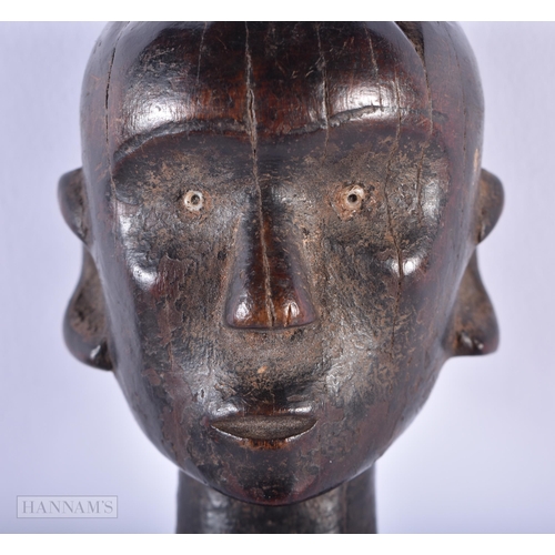 309 - AN ANTIQUE AFRICAN TRIBAL CARVED WOOD FIGURE. 30 cm high.