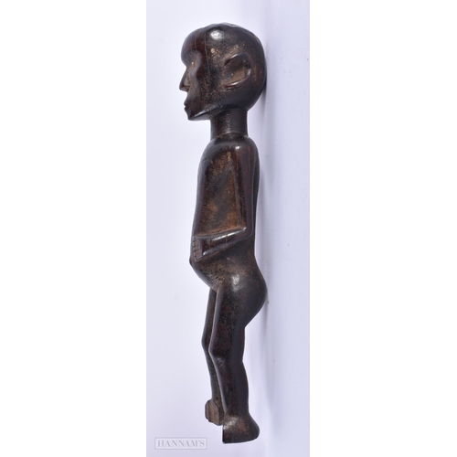 309 - AN ANTIQUE AFRICAN TRIBAL CARVED WOOD FIGURE. 30 cm high.