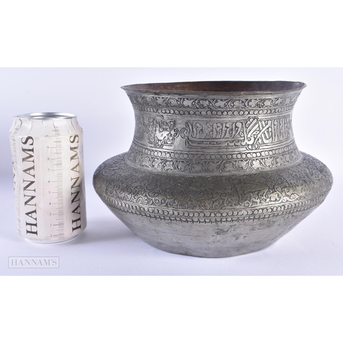 31 - AN 18TH CENTURY MIDDLE EASTERN ISLAMIC COPPER ALLOY SPITTOON decorated with calligraphy and birds. 2... 