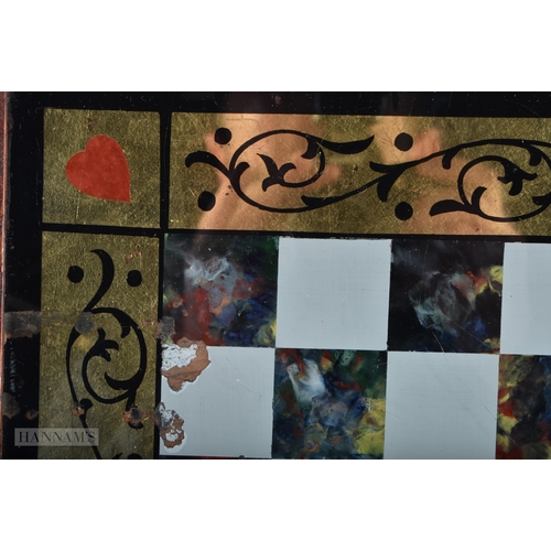 311 - AN ANTIQUE REVERSE PAINTED GLASS GAMING CHESS BOARD. 45cm square.