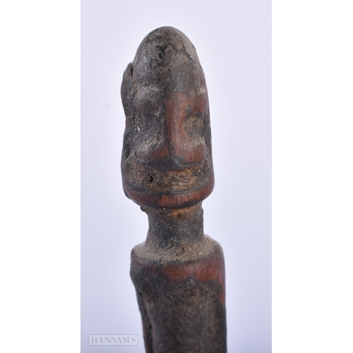 312 - A GROUP OF ANTIQUE AFRICAN TRIBAL CARVED WOOD FIGURES. Largest 15cm high. (5)