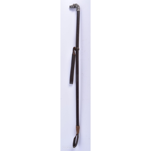 314 - A LATE VICTORIAN/EDWARDIAN WHITE METAL EQUESTRIAN HORN HEAD RIDING CROP. 60cm long.