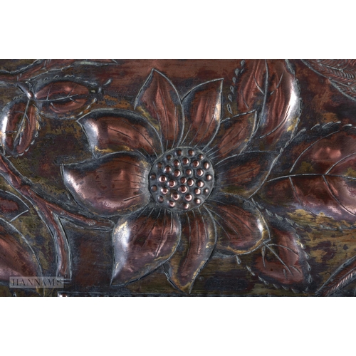 316 - AN ENGLISH ARTS AND CRAFTS OAK AND COPPER REPOUSSE MIRRORED SCREEN. 60cm x 45cm.