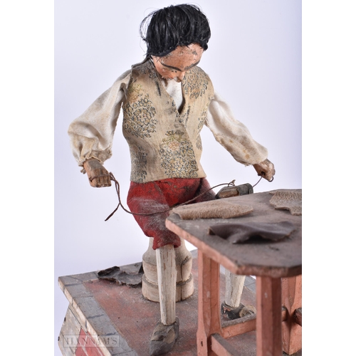 320 - A RARE 19TH CENTURY EUROPEAN FOLK ART AUTOMATON PAINTED WOOD MODEL depicting two leather workers at ... 