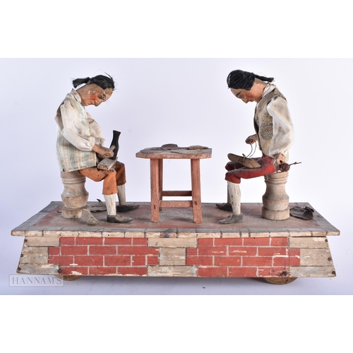 320 - A RARE 19TH CENTURY EUROPEAN FOLK ART AUTOMATON PAINTED WOOD MODEL depicting two leather workers at ... 