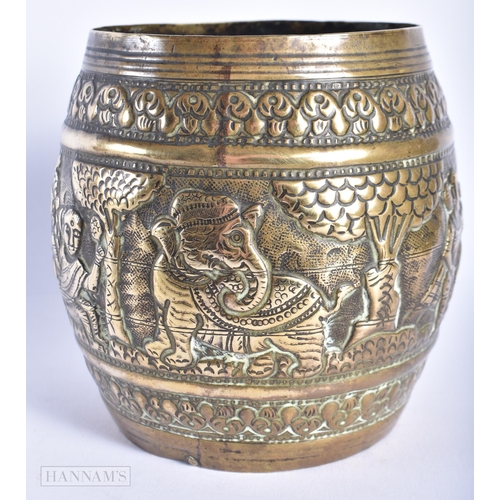 325 - AN 18TH/19TH CENTURY INDIAN EMBOSSED BRASS CENSER decorated with hindu deities. 12 cm x 10 cm.