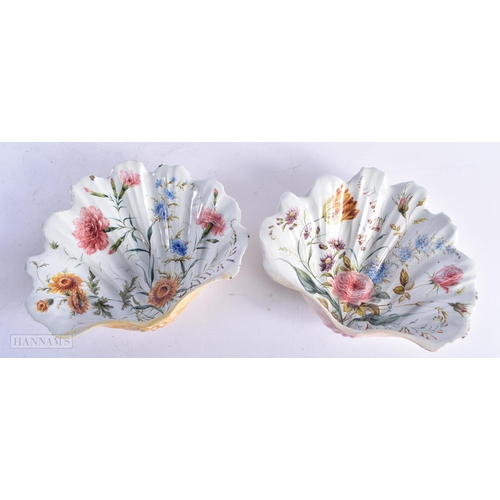 330 - A PAIR OF 19TH CENTURY ITALIAN TIN GLAZED NOVE POTTERY SHELL DISHES painted with flowers. 25 cm x 18... 