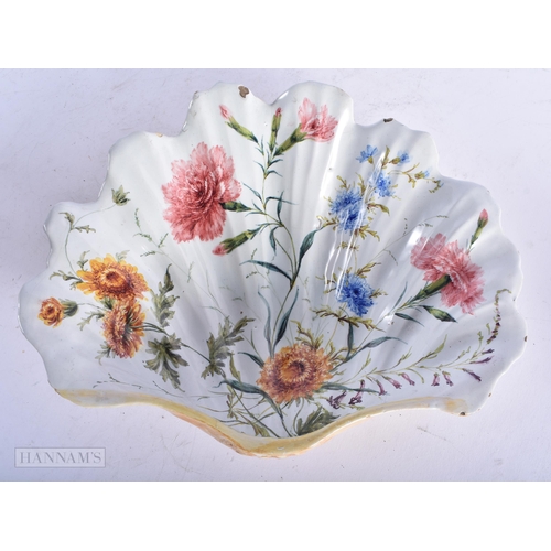 330 - A PAIR OF 19TH CENTURY ITALIAN TIN GLAZED NOVE POTTERY SHELL DISHES painted with flowers. 25 cm x 18... 