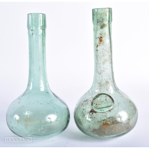 332 - TWO ANTIQUE SMALL WINE BOTTLES. Largest 19 cm high. (2)