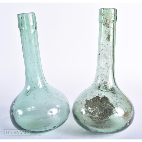 332 - TWO ANTIQUE SMALL WINE BOTTLES. Largest 19 cm high. (2)