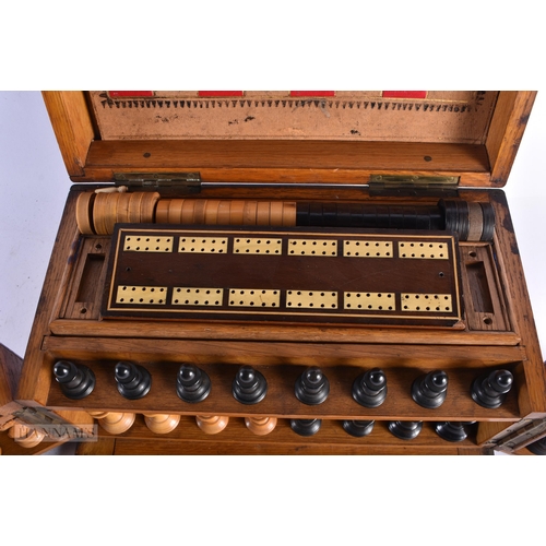 334 - A LOVELY LATE VICTORIAN CARVED OAK GAMING COMPENDIUM signed to interior Austin & Co Dublin, with mul... 