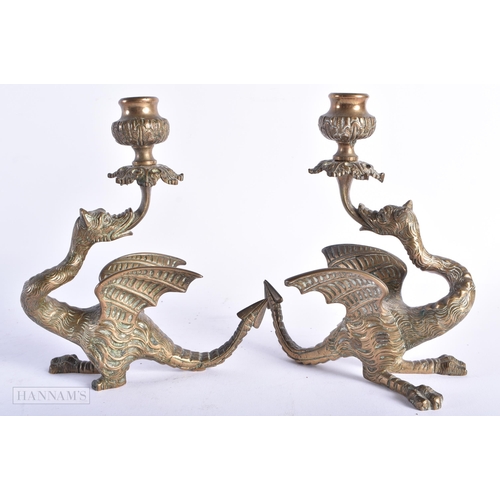 339 - A PAIR OF 19TH CENTURY EUROPEAN MYTHICAL BEAST BRONZE CANDLESTICKS. 18cm x 12 cm.