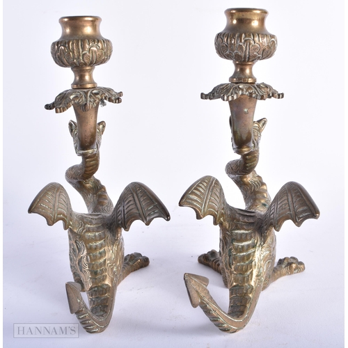 339 - A PAIR OF 19TH CENTURY EUROPEAN MYTHICAL BEAST BRONZE CANDLESTICKS. 18cm x 12 cm.