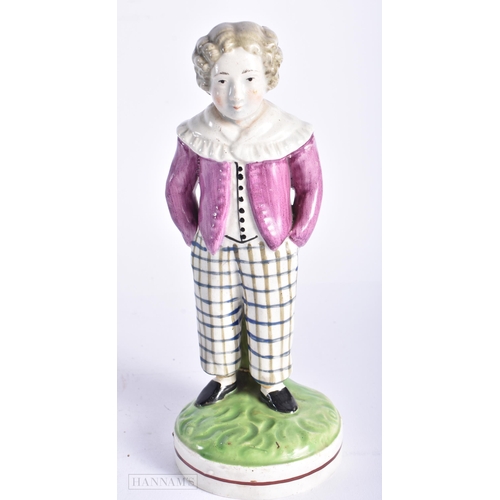 340 - AN EARLY 19TH CENTURY ENGLISH STAFFORDSHIRE PEARLWARE FIGURE OF A MALE together with a robin's egg g... 