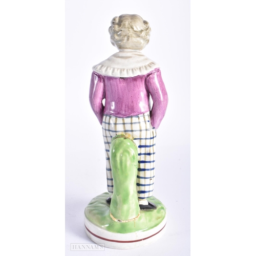 340 - AN EARLY 19TH CENTURY ENGLISH STAFFORDSHIRE PEARLWARE FIGURE OF A MALE together with a robin's egg g... 