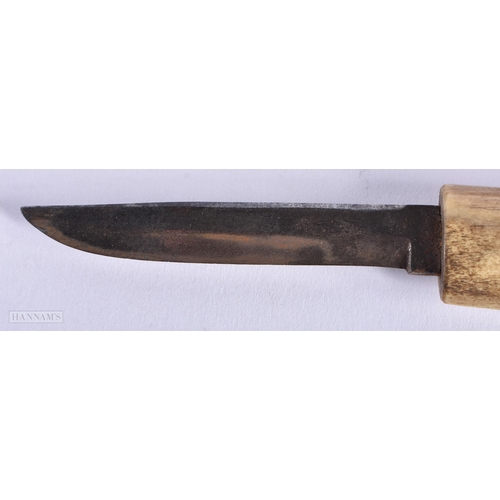 341 - AN ANTIQUE TRIBAL GREENLAND ESKIMO CARVED CARIBOU ANTLER KNIFE. 22cm long. We do not offer in-house ... 