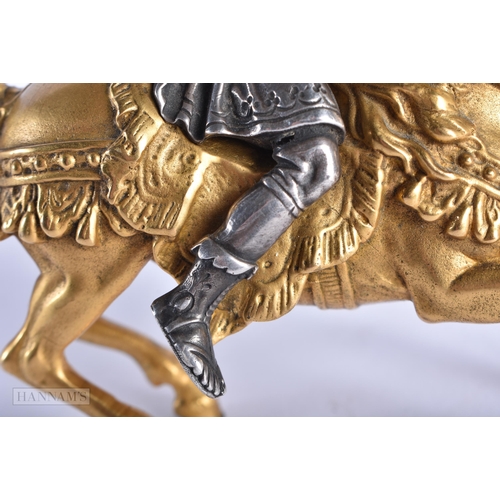 351 - A FINE EARLY 19TH CENTURY SILVERED BRONZE AND ORMOLU FIGURE OF A SOLDIER modelled upon a gilded hors... 