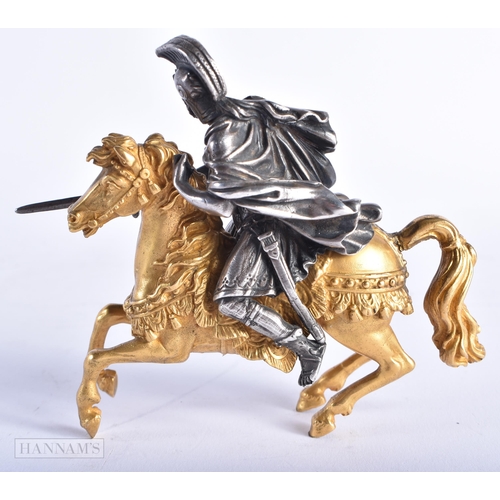 351 - A FINE EARLY 19TH CENTURY SILVERED BRONZE AND ORMOLU FIGURE OF A SOLDIER modelled upon a gilded hors... 