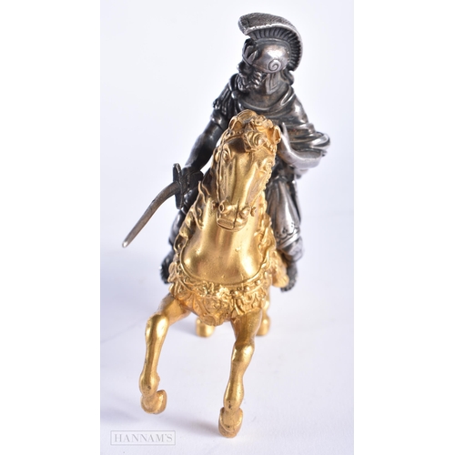 351 - A FINE EARLY 19TH CENTURY SILVERED BRONZE AND ORMOLU FIGURE OF A SOLDIER modelled upon a gilded hors... 