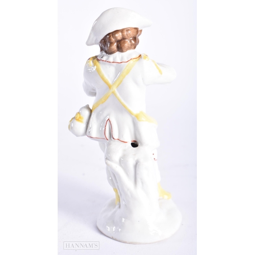 355 - AN ANTIQUE CONTINENTAL PORCELAIN FIGURE OF A BOY. 13 cm high.