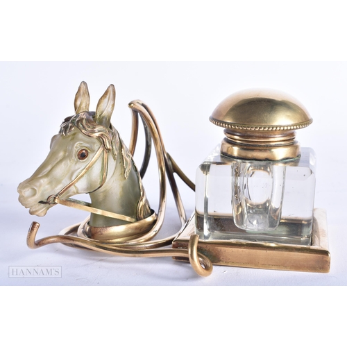 356 - A FINE LATE VICTORIAN/EDWARDIAN EQUESTRIAN BRONZE AND GLASS INKWELL formed with a horses head betwee... 