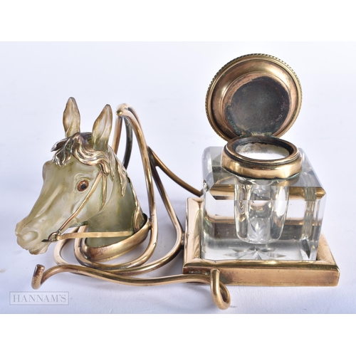 356 - A FINE LATE VICTORIAN/EDWARDIAN EQUESTRIAN BRONZE AND GLASS INKWELL formed with a horses head betwee... 