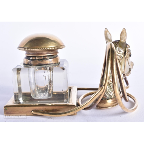 356 - A FINE LATE VICTORIAN/EDWARDIAN EQUESTRIAN BRONZE AND GLASS INKWELL formed with a horses head betwee... 