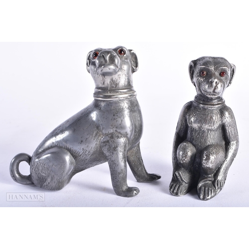 357 - TWO EARLY VICTORIAN NOVELTY PEWTER DESK SANDERS with glass eyes, modelled as a dog and a monkey. Lar... 