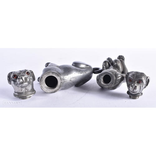 357 - TWO EARLY VICTORIAN NOVELTY PEWTER DESK SANDERS with glass eyes, modelled as a dog and a monkey. Lar... 