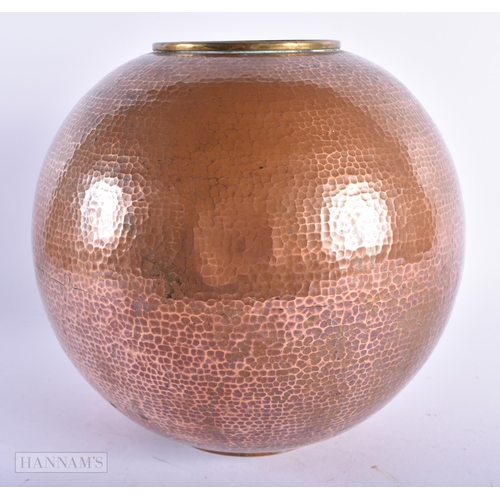 3 - AN ART DECO HAMMERED COPPER GLOBULAR VASE. 22cm x 19 cm.