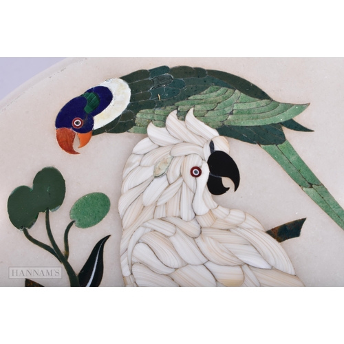 363 - AN EARLY 20TH CENTURY CONTINENTAL PIETRA DURA INLAID STONE BOX AND COVER decorated with birds amongs... 