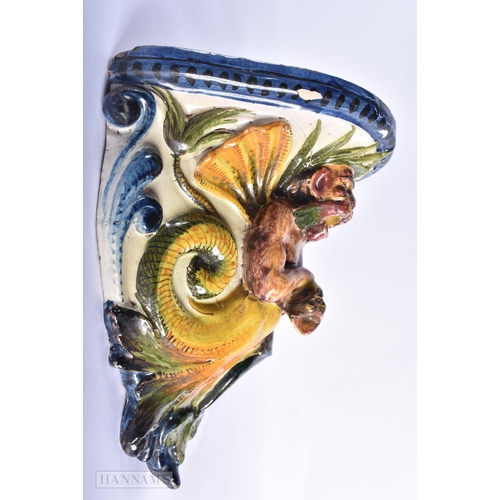 368 - AN EARLY 19TH CENTURY ITALIAN FAIENCE POTTERY GROTESQUE WALL BRACKET. 27cm x 20 cm.