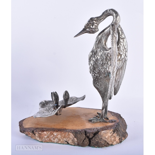 373 - A RARE VICTORIAN SILVER PLATED FIGURE OF A BIRD together with another figural group of birds feeding... 