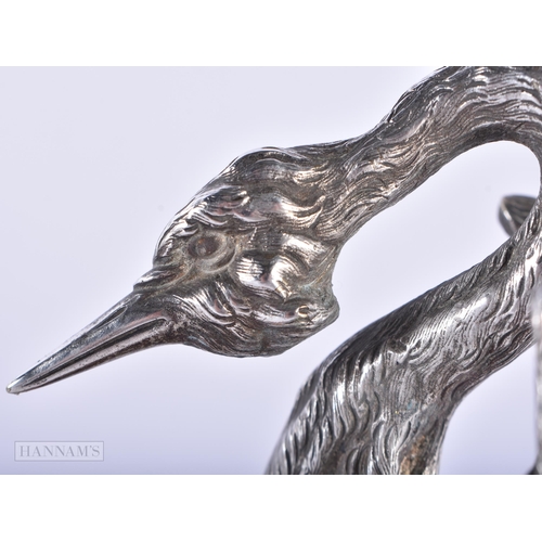 373 - A RARE VICTORIAN SILVER PLATED FIGURE OF A BIRD together with another figural group of birds feeding... 