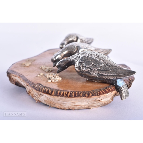 373 - A RARE VICTORIAN SILVER PLATED FIGURE OF A BIRD together with another figural group of birds feeding... 