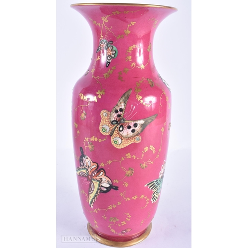 381 - AN UNUSUAL EARLY 19TH CENTURY ENGLISH POTTERY VASE painted in the Chinese Export Qianlong manner. 34... 