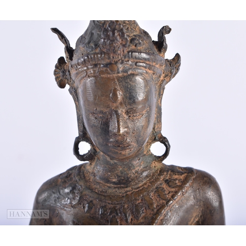 386 - AN EARLY SOUTH EAST ASIAN BRONZE FIGURE OF A STANDING BUDDHA. 34.5 cm high.